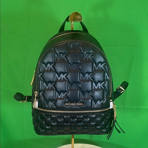 Michael Kors Handbags - Michael Kors Embossed Black Backpack